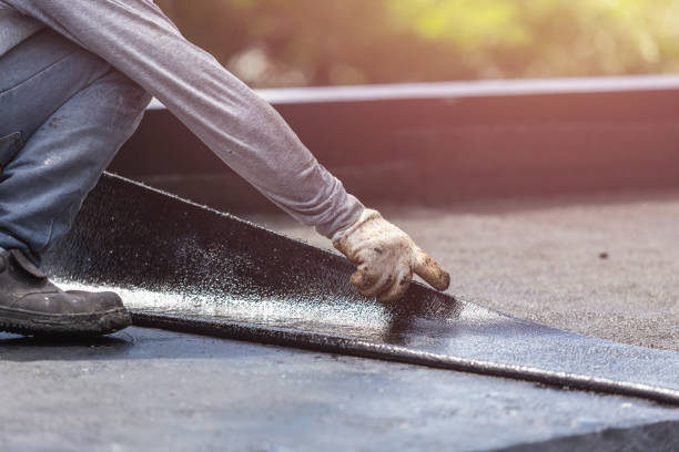 Professional Basement Waterproofing technician working in Clio, MI